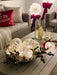 Mercury glass onion ornaments displayed in a festive living room setting