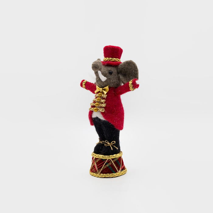 Felt circus elephant ringmaster on drum – left angle