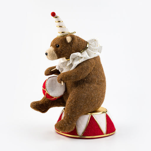 Felt circus bear playing a drum – left angle