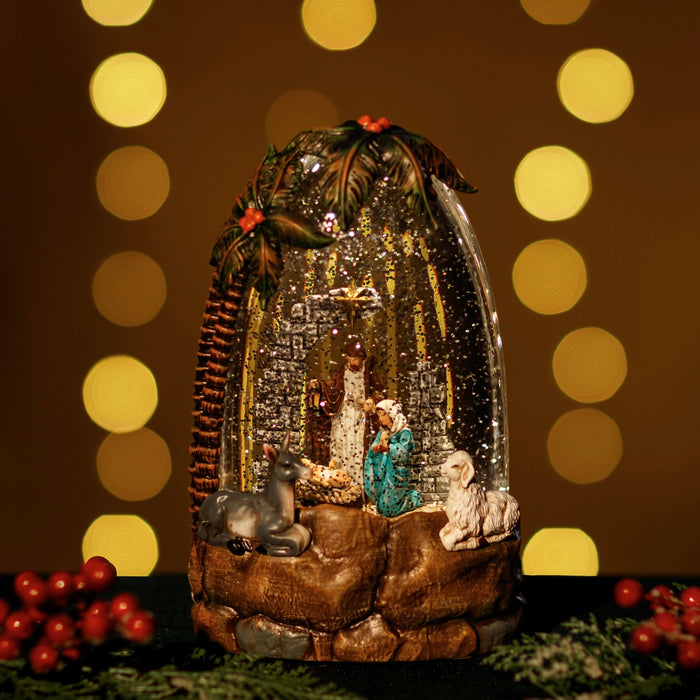 Snowing Palm Tree Globe w/ Holy Family