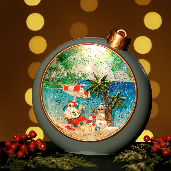 Blue Snowing Ornament w/ Santa on the Beach
