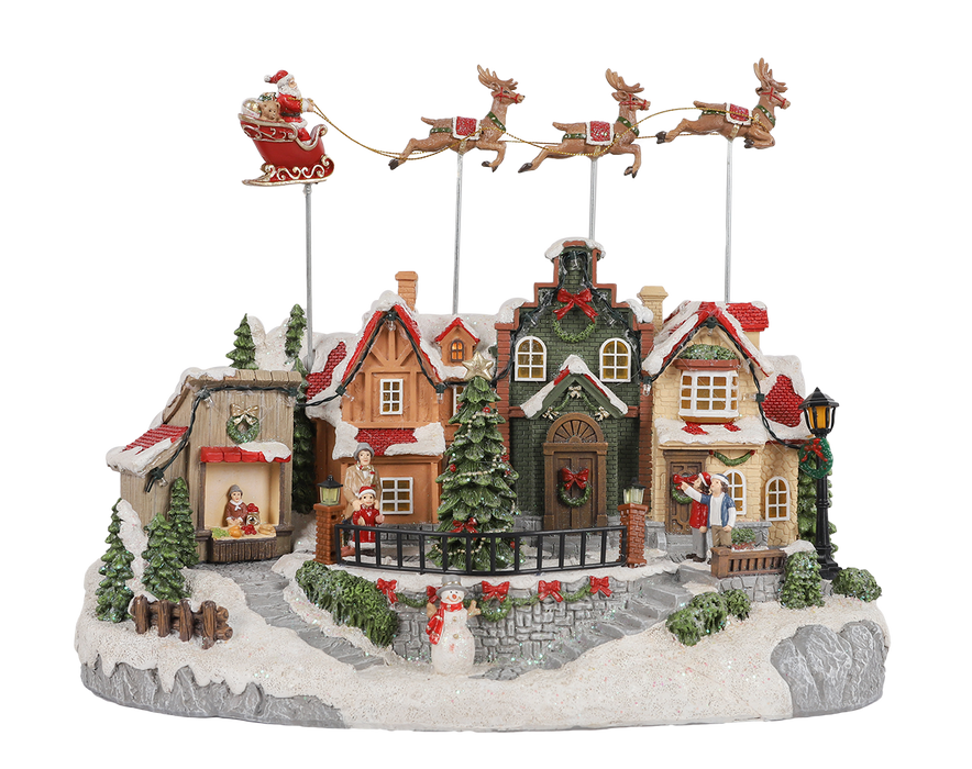 Animated Christmas village with Santa sleigh and reindeer – front view