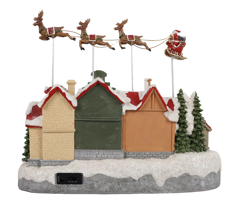 Animated Christmas village with Santa sleigh and reindeer – rear view