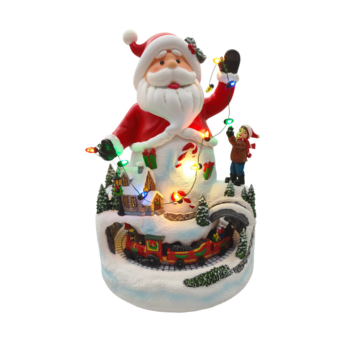 Animated Santa with rotating Christmas train – illuminated front view
