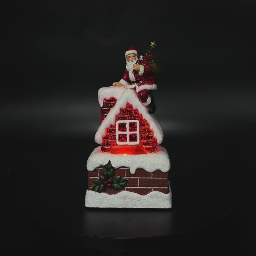 Snowing Petite Chimney with Santa illuminated Christmas decoration video
