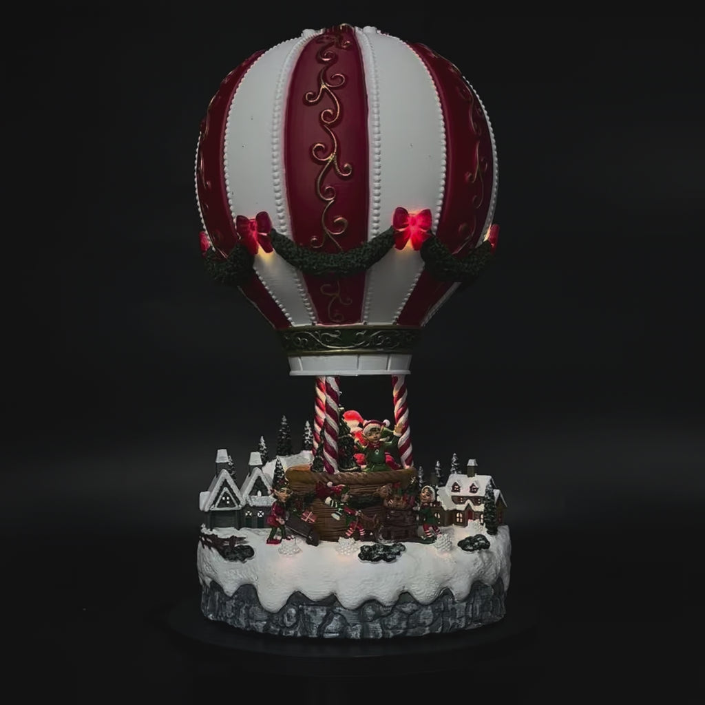 Lighted hot air balloon with Santa in motion