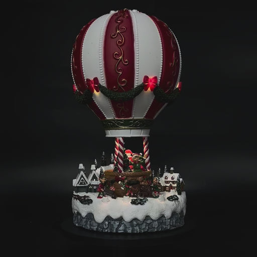Lighted hot air balloon with Santa in motion