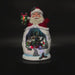 Animated Santa with rotating Christmas village in motion