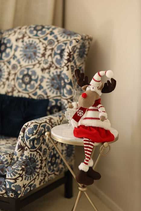 Sitting Reindeer with Red & White Sweater